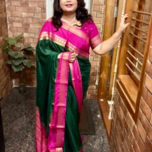 Embrace the charm of tradition with our exquisite Green Mysore Crepe Silk featuring a lovely Pink Border